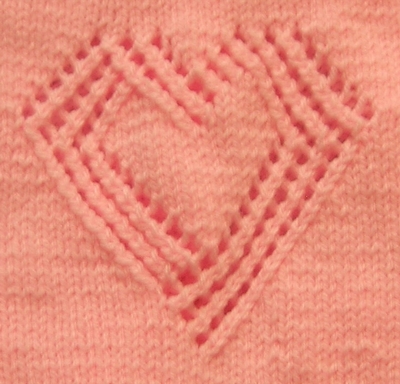 coeur ajouré tricoté